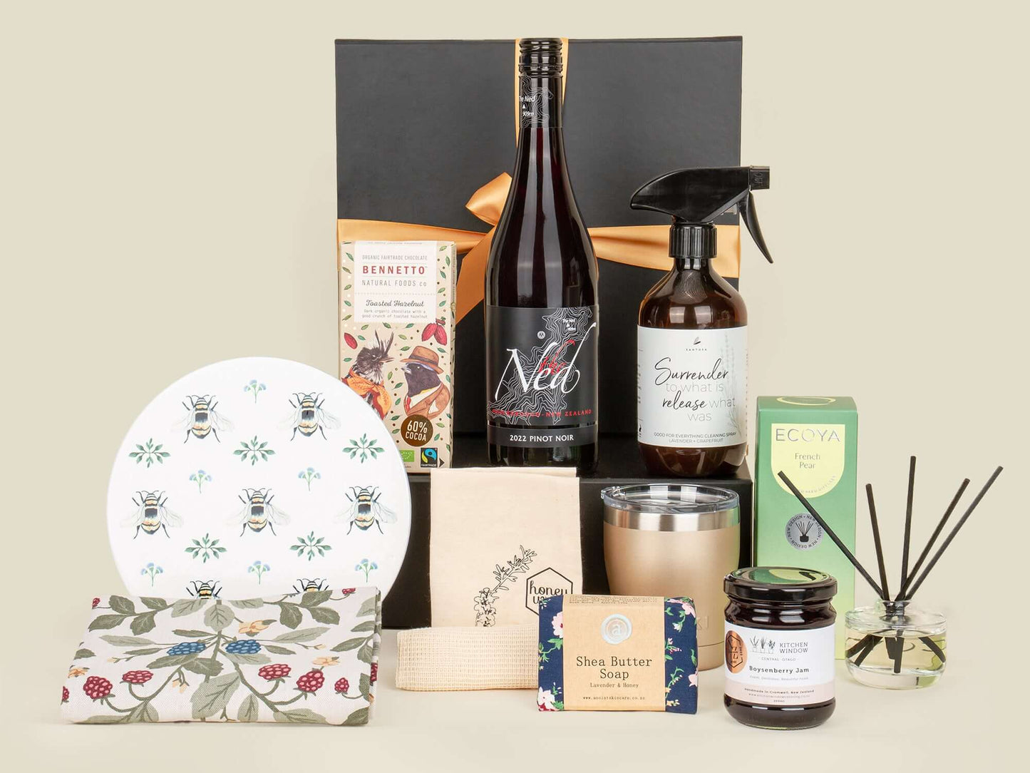 Your Place Gift Box featuring wine, chocolates, kitchenware, and home essentials.