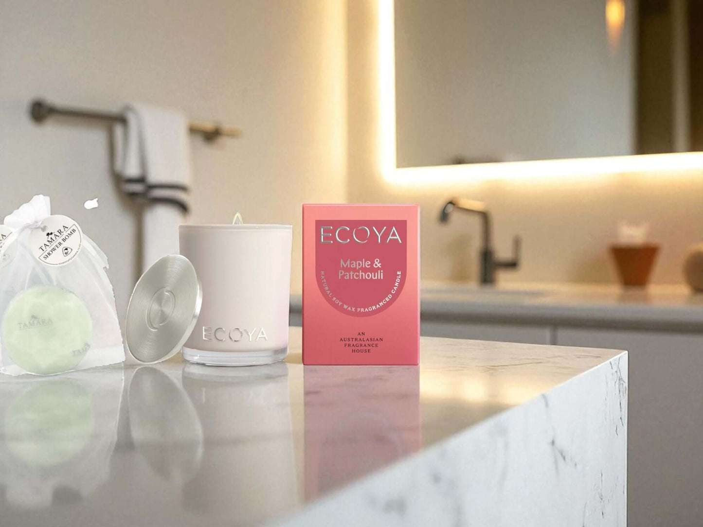 Ecoya candle and packaging on a bathroom counter