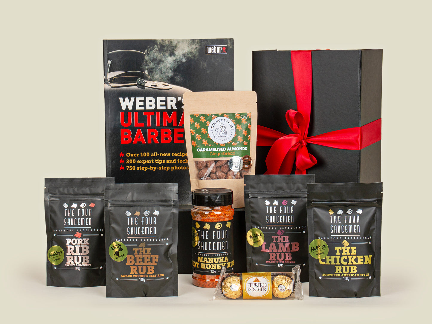 Collection of barbecue products including packaging and containers on a neutral background