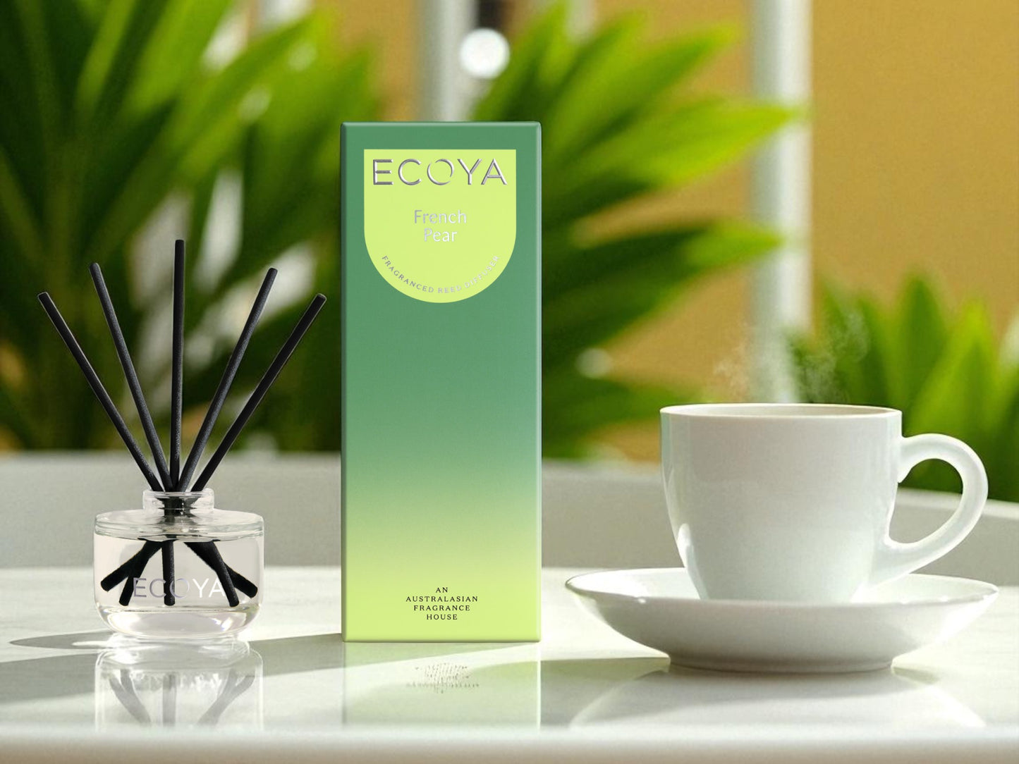 Eccoya diffuser with packaging and a cup of tea on a table