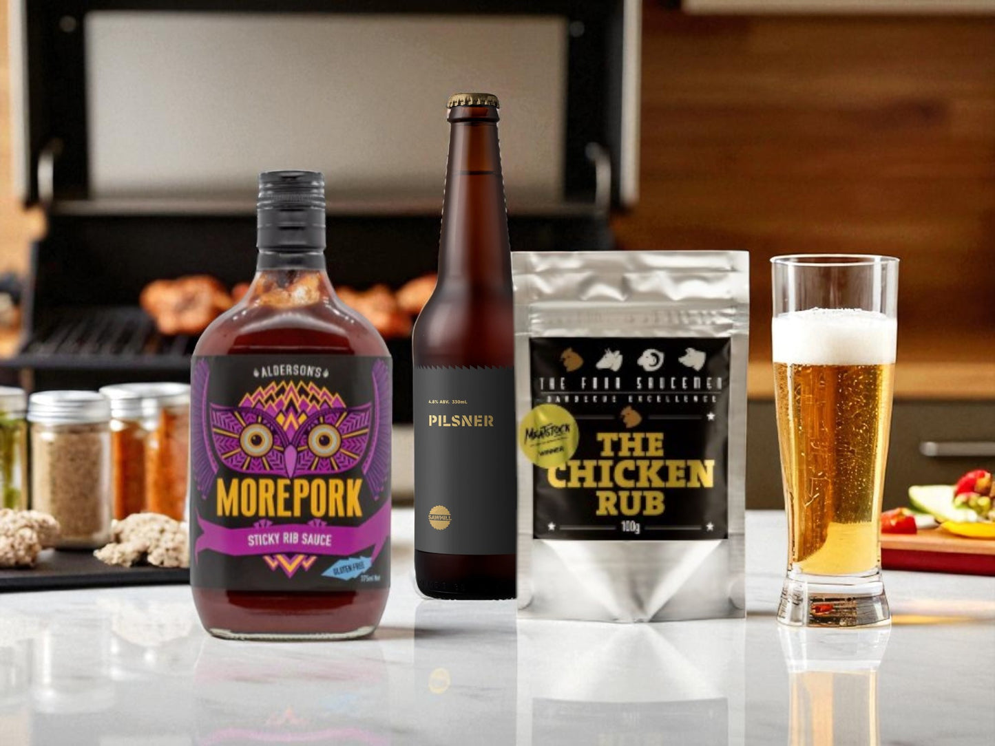 Beverages and food items including a bottle of sauce, beer, and a bag of seasoning on a counter.